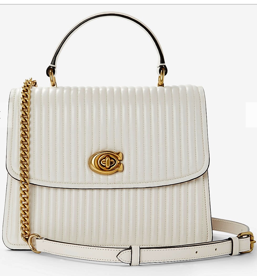 New season fashion bags for Spring and Summer 2019.  Single colour bags including the quilted top handle bag in chalk white from Coach.