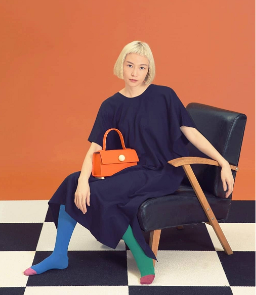 SS19 fashion bags instore and online now including an orange mini trapezoid satchel bag from Matter Matters